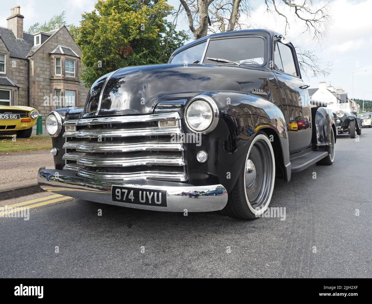 Customised Chevrolet `Advanced Design` Pickup truck, made in 1953, with a 3.5lt straight six engine in black, with chrome grill & white wall tyres. Stock Photo